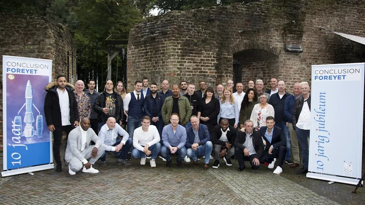 Groepsfoto van collega's van ForeyeT