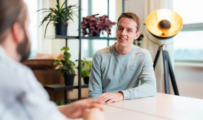 Wilko sitting at a table