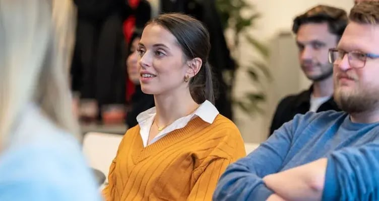 colleagues sitting during session