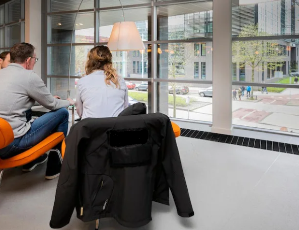 A woman behind a desk