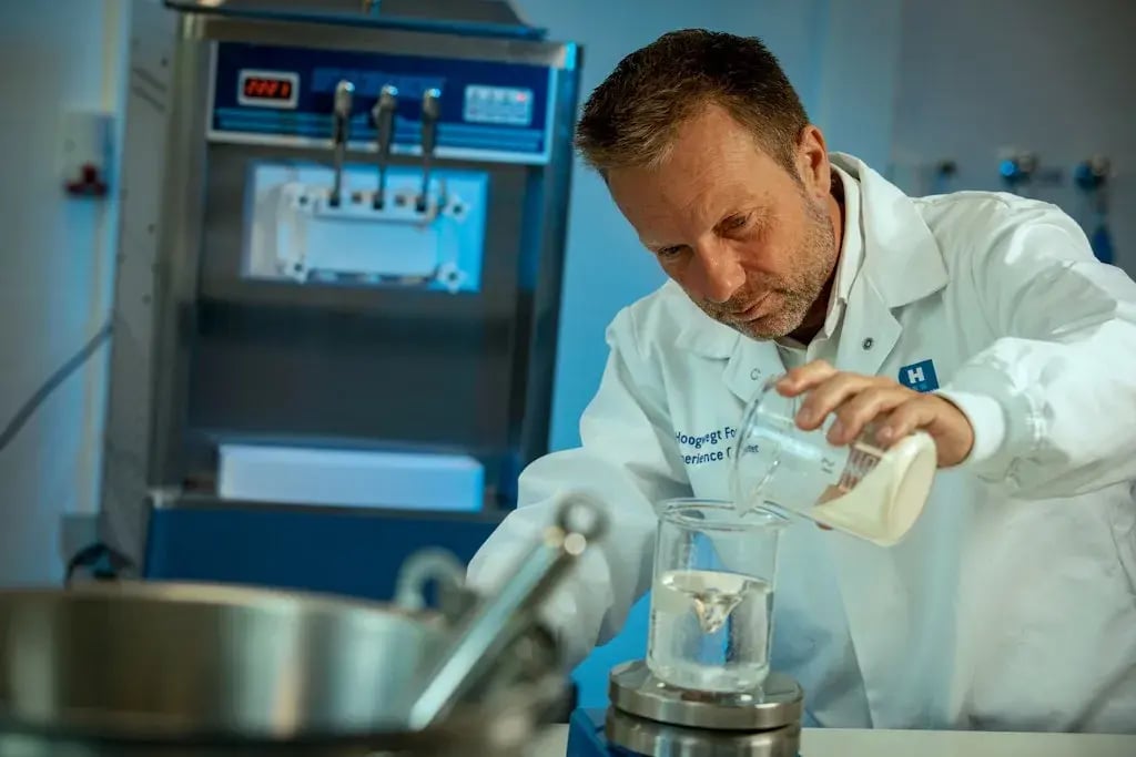 Man in a labratory is experimenting