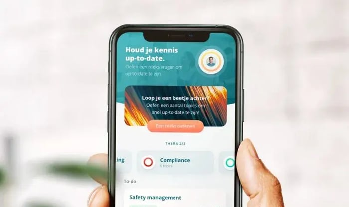 Een iPhone laat een Compliance app zien