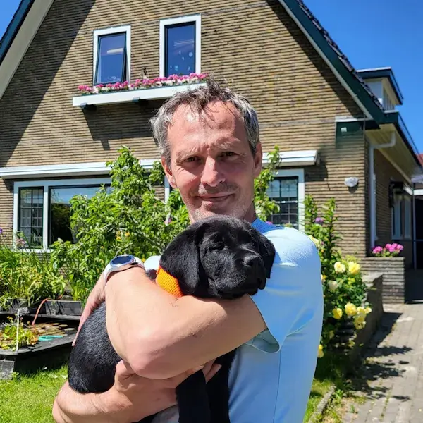 Henk met een hond.