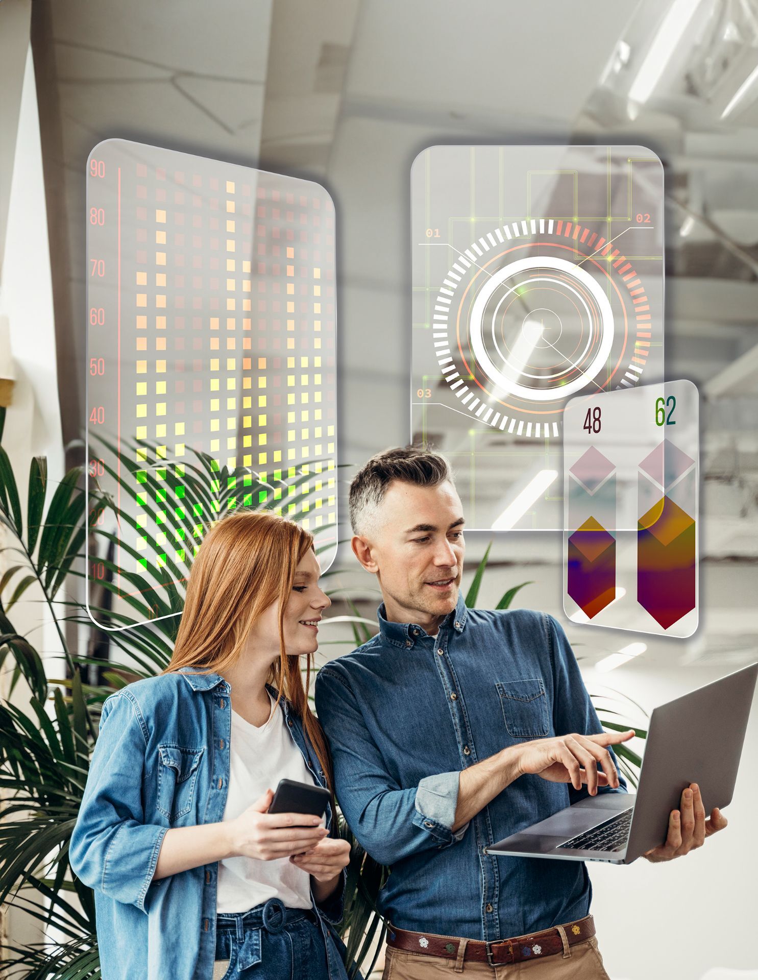 Colleague shows another colleague something on laptop screen