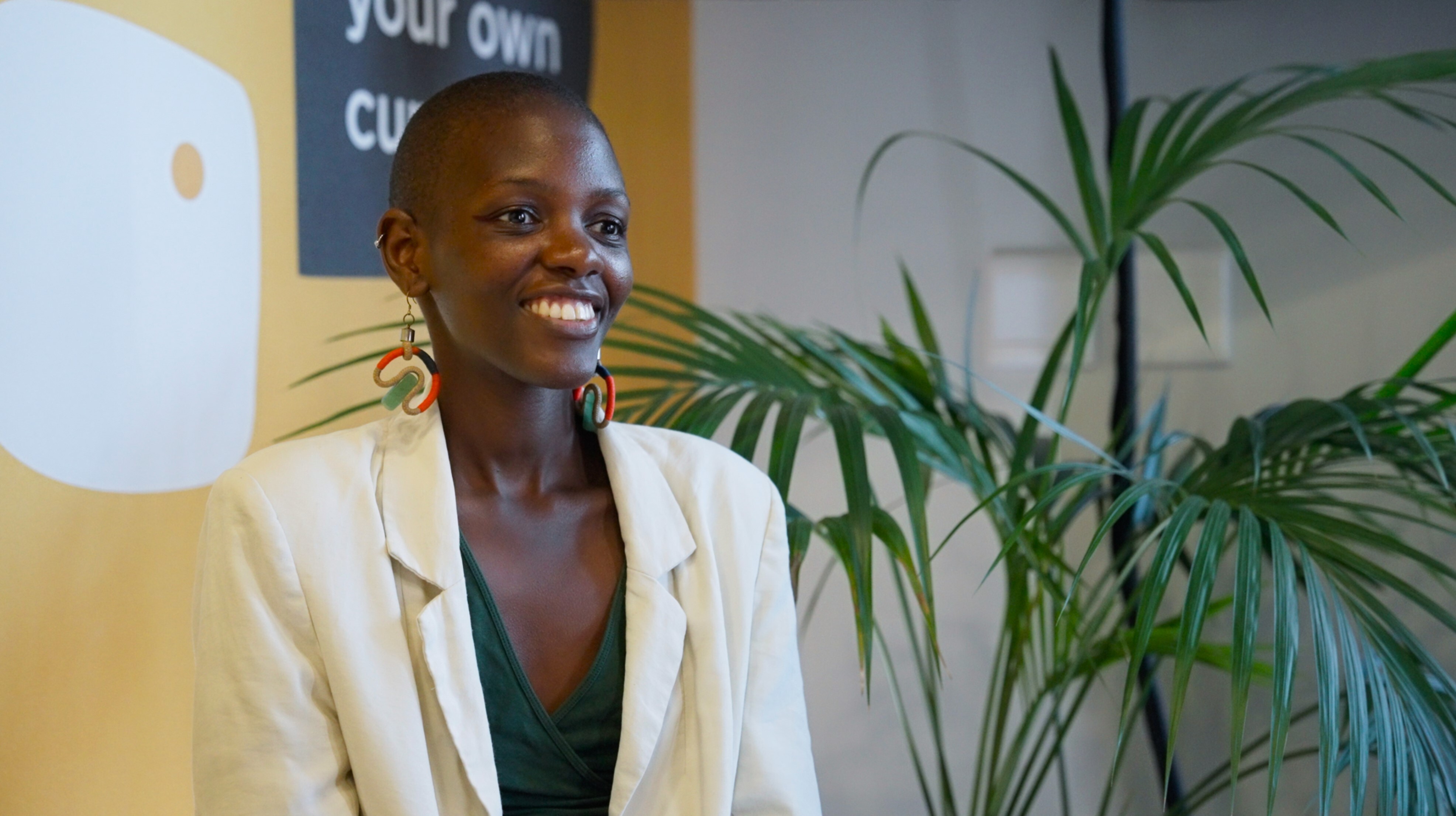 Woman is laughing at the camera.